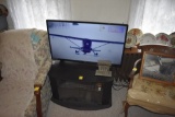 Sanyo Flat Screen TV on stand