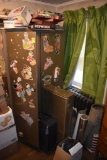 Metal bifold cabinet, games and books, suitcase, metal case, old rug, some flashing