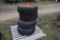 New Camso 10-16.5 Skidsteer Tires on Orange 8 Lug rims