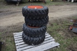 New Camso 10-16.5 Skidsteer Tires on Orange 8 Lug rims