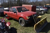 1997 Toyota Tacoma with snow Plow