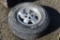 Firestone 235/75R15 Tire on 5 Lug Jeep Rim
