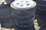 4 Bridgestone 215/70R16 Tires on 5 Lug Toyota Rims
