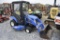 New Holland TZ25DA tractor with Loader and Mower Deck
