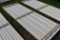 25 Pieces of 10' Sections of Beige Corrugated Metal Paneling