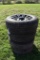 Set of 4 Discoverer 275/60R20 tires on XD Series 5 lug rims