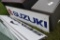 Suzuki Two Sided Sign