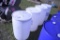 Four Plastic Drums