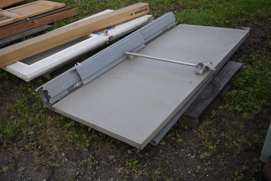 Two metal doors with framing pieces