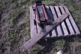 60' Cutting Blade And A Hydraulic Jack
