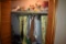 Closet of contents including books clothes