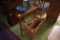 Small half circle end table with magazine holder