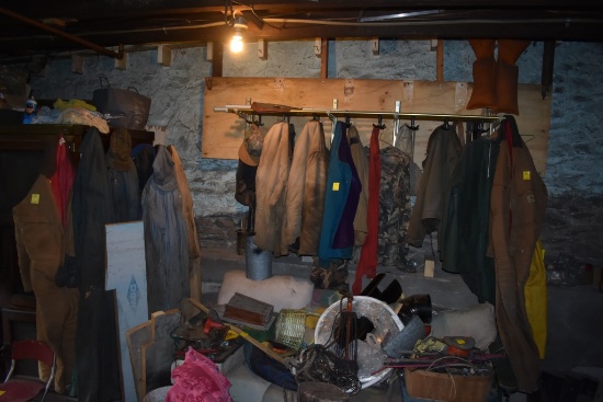 Group of Work related Clothing Hanging on Wall