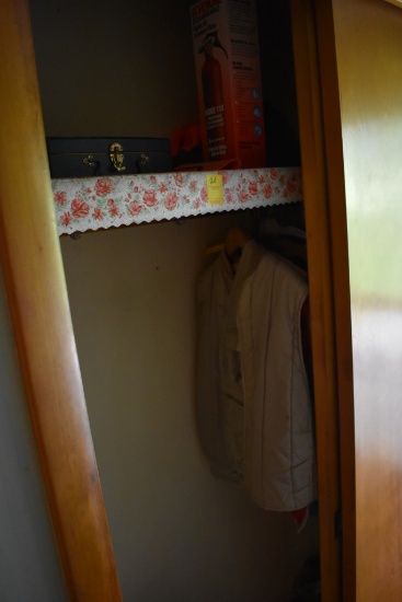 Contents of Closet in Walk-in of House
