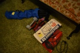 Little Blue camping chair with misc exercise weights and dirt devil vacuum
