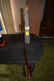 Glass bottle of Dirt from Poland circa 1966 and wooden cane with lacquer