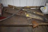 Group of Older hand Saws, hand Scythe, level