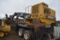 CAT 559 Knuckleboom Loader on Riley Trailer