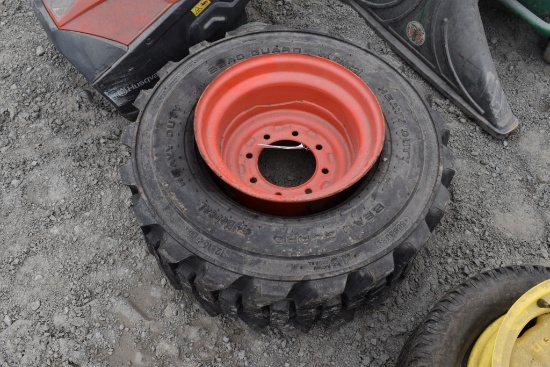 Bobcat 12-16.5 Skid Steer Tire on 8 Lug Rim