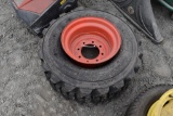 Bobcat 12-16.5 Skid Steer Tire on 8 Lug Rim