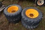 4 12-16.5 Skid Steer Tires on 8 Lug Rims