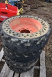 4 10-16.5 Solid Rubber Tires on 8 Lug Rims