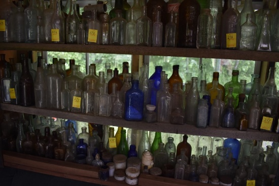 Shelf of Vintage Bottles