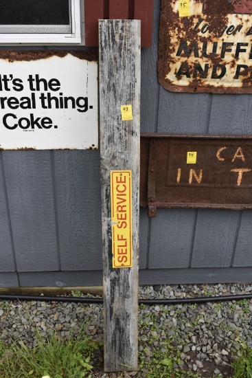 Self Service Sign on Wood Plank