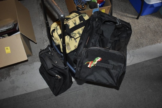 Box of Three Suitcases and a Cooler