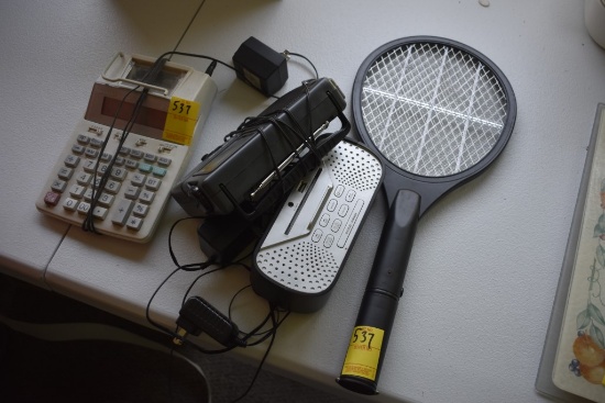 Electric Fly Swatter, Two Radio Clocks and an Adding Machine