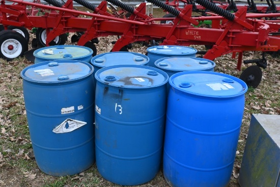 7 50 Gallon Plastic Barrels