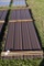 32 Pieces of 10' Sections of Brown Corrugated Metal Paneling