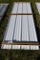 26 Pieces of 10' Sections of white Corrugated Metal Paneling