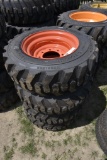 Set of 4 Forerunner 10-16.5 NHS Skidsteer Tires on 8 Lug Rims