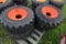 Set of 4 Forerunner 12-16.5 Skid Steer Tires on 8 Lug Rims