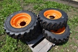 4 Forerunner 10-16.5 NHS Skid Steer Tires on 8 Lug Rims