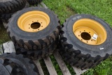 Set of 4 Forerunner 10-16.5 Skid Steer Tires on 8 Lug Rims