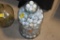 Glass Jug Full of Golf Balls