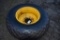 Goodyear 16.9-24 Tire on 9 Lug Rim