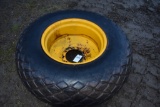 Goodyear 16.9-24 Tire on 9 Lug Rim