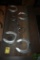 Four Horse Shoes and a Bit on a Wooden Plaque