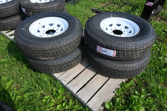 4 Atlas ST235/80R16 Tires on 8 Lug Rims