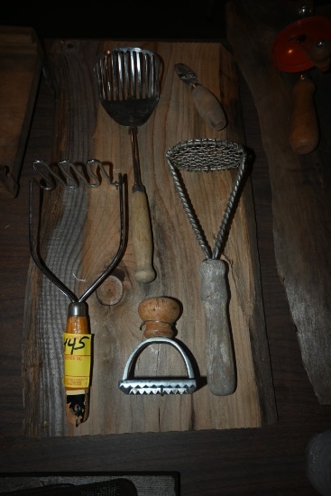 Five Culinary Tools on a Wooden Plaque