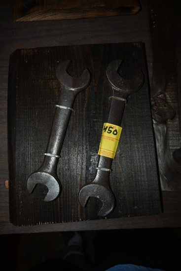 Two Wrenches on a Wooden Plaque