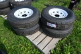 4 Atlas ST235/80R16 Tires on 8 Lug Rims