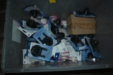 Tote of Toilet Flappers and Sink Stoppers