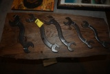 Five Champion Wrenches on Wooden Plaque