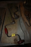 Two Vintage Hand Drills on a Wooden Plaque