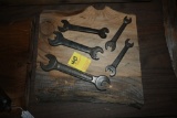 Five Wrenches on a Wooden Plaque