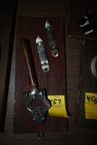 Three Vintage Can Openers on a Wooden Plaque